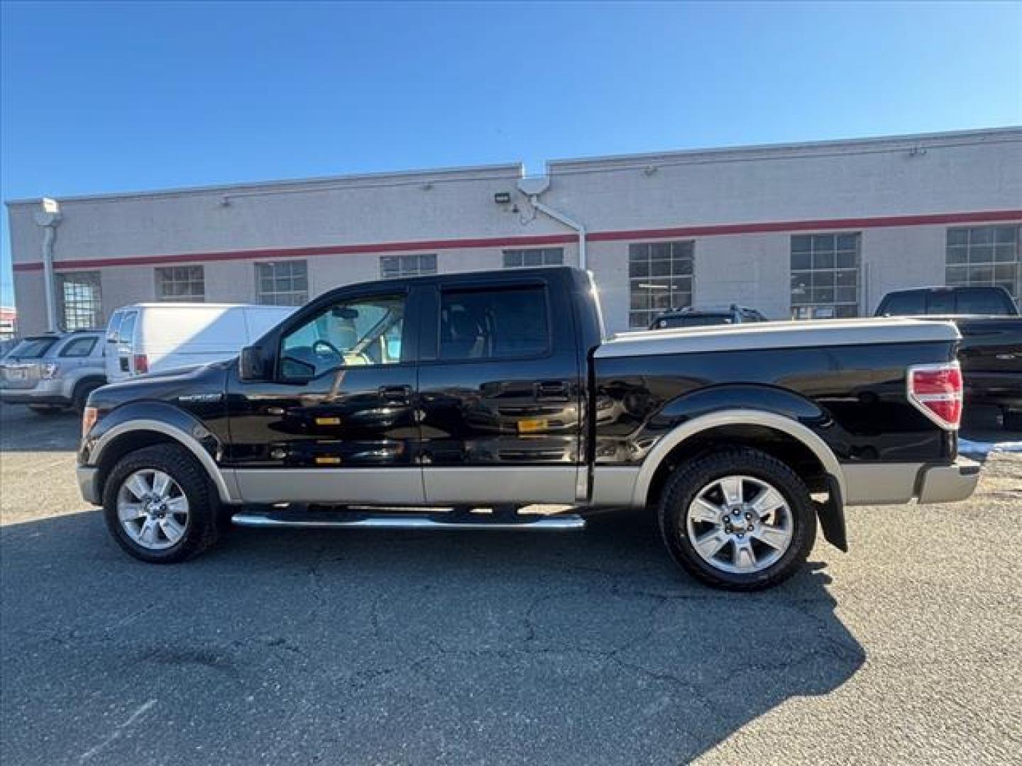 2009 Black Ford F-150 Lariat (1FTPW12V19F) with an 5.4L Triton 5.4L Flex Fuel V8 320hp 390ft. lbs. Sequential-Port F.I. engine, 6-Speed Automatic transmission, located at 50 Eastern Blvd., Essex, MD, 21221, (410) 686-3444, 39.304367, -76.484947 - Photo#1