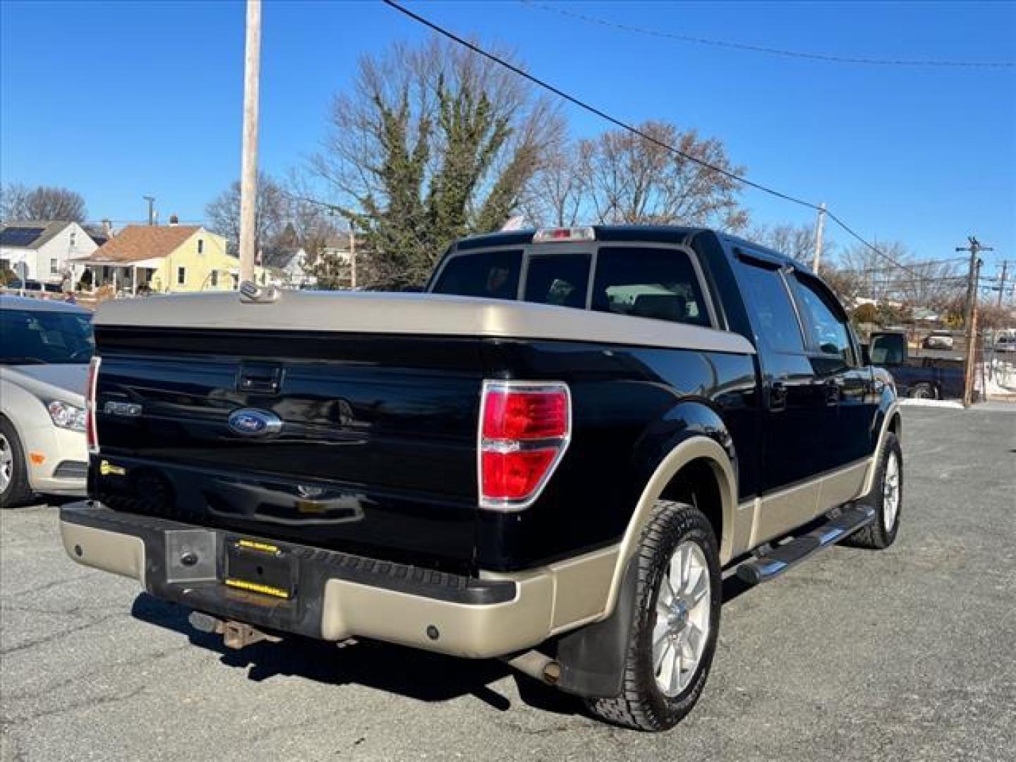 2009 Black Ford F-150 Lariat (1FTPW12V19F) with an 5.4L Triton 5.4L Flex Fuel V8 320hp 390ft. lbs. Sequential-Port F.I. engine, 6-Speed Automatic transmission, located at 50 Eastern Blvd., Essex, MD, 21221, (410) 686-3444, 39.304367, -76.484947 - Photo#4