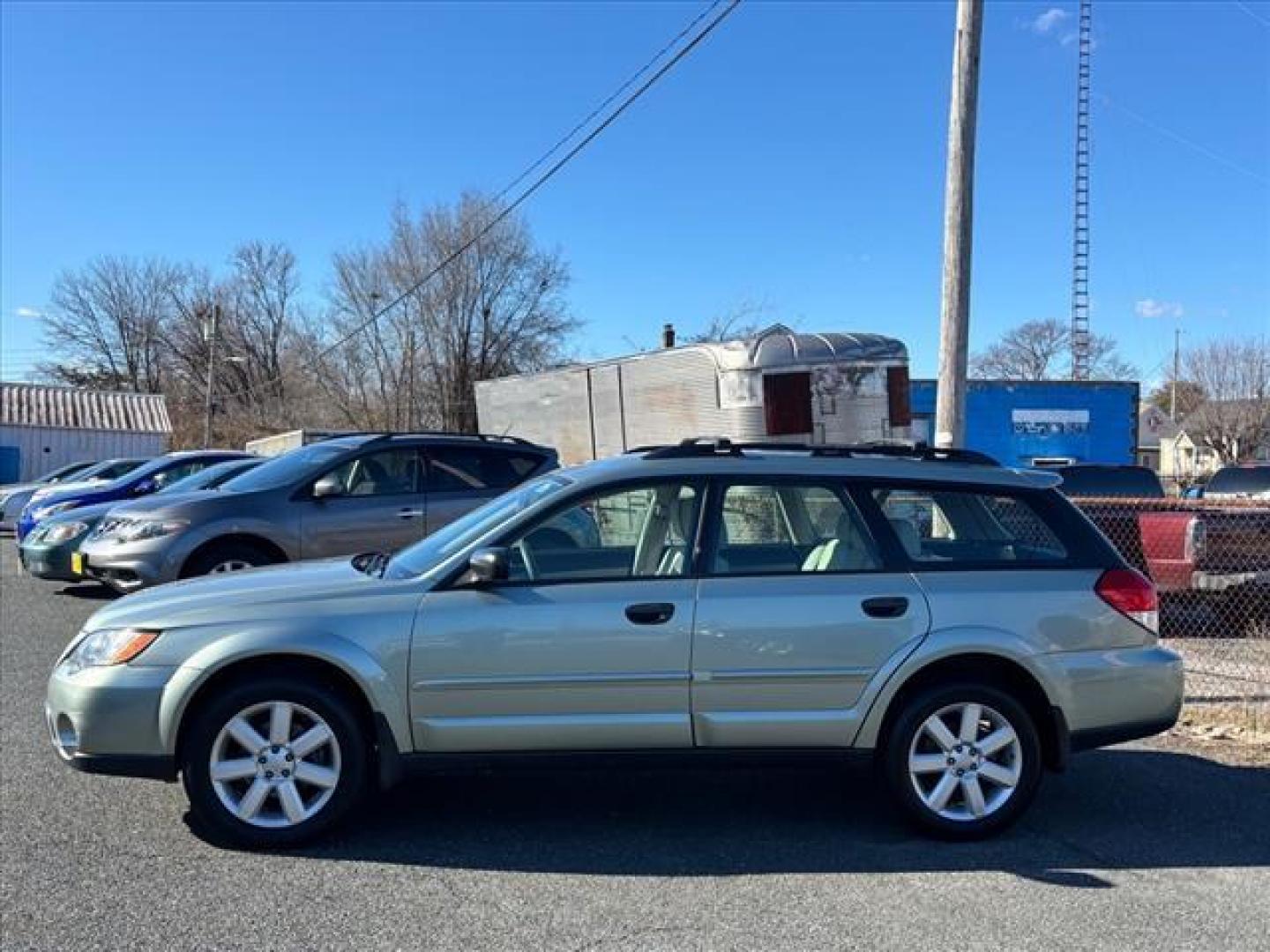 2009 Green Subaru Outback 2.5i Special Edition (4S4BP61C897) with an 2.5L 4 Cylinder Sequential-Port F.I. engine, Automatic transmission, located at 50 Eastern Blvd., Essex, MD, 21221, (410) 686-3444, 39.304367, -76.484947 - Photo#1