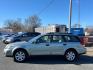 2009 Green Subaru Outback 2.5i Special Edition (4S4BP61C897) with an 2.5L 4 Cylinder Sequential-Port F.I. engine, Automatic transmission, located at 50 Eastern Blvd., Essex, MD, 21221, (410) 686-3444, 39.304367, -76.484947 - Photo#1