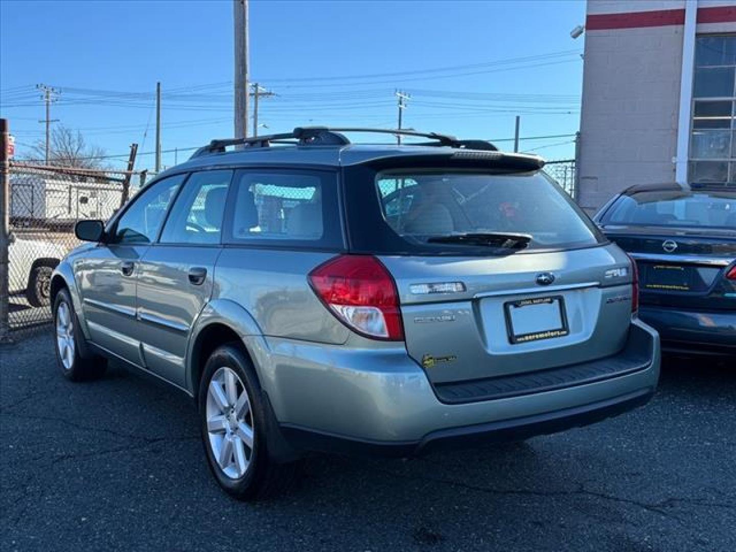 2009 Green Subaru Outback 2.5i Special Edition (4S4BP61C897) with an 2.5L 4 Cylinder Sequential-Port F.I. engine, Automatic transmission, located at 50 Eastern Blvd., Essex, MD, 21221, (410) 686-3444, 39.304367, -76.484947 - Photo#2