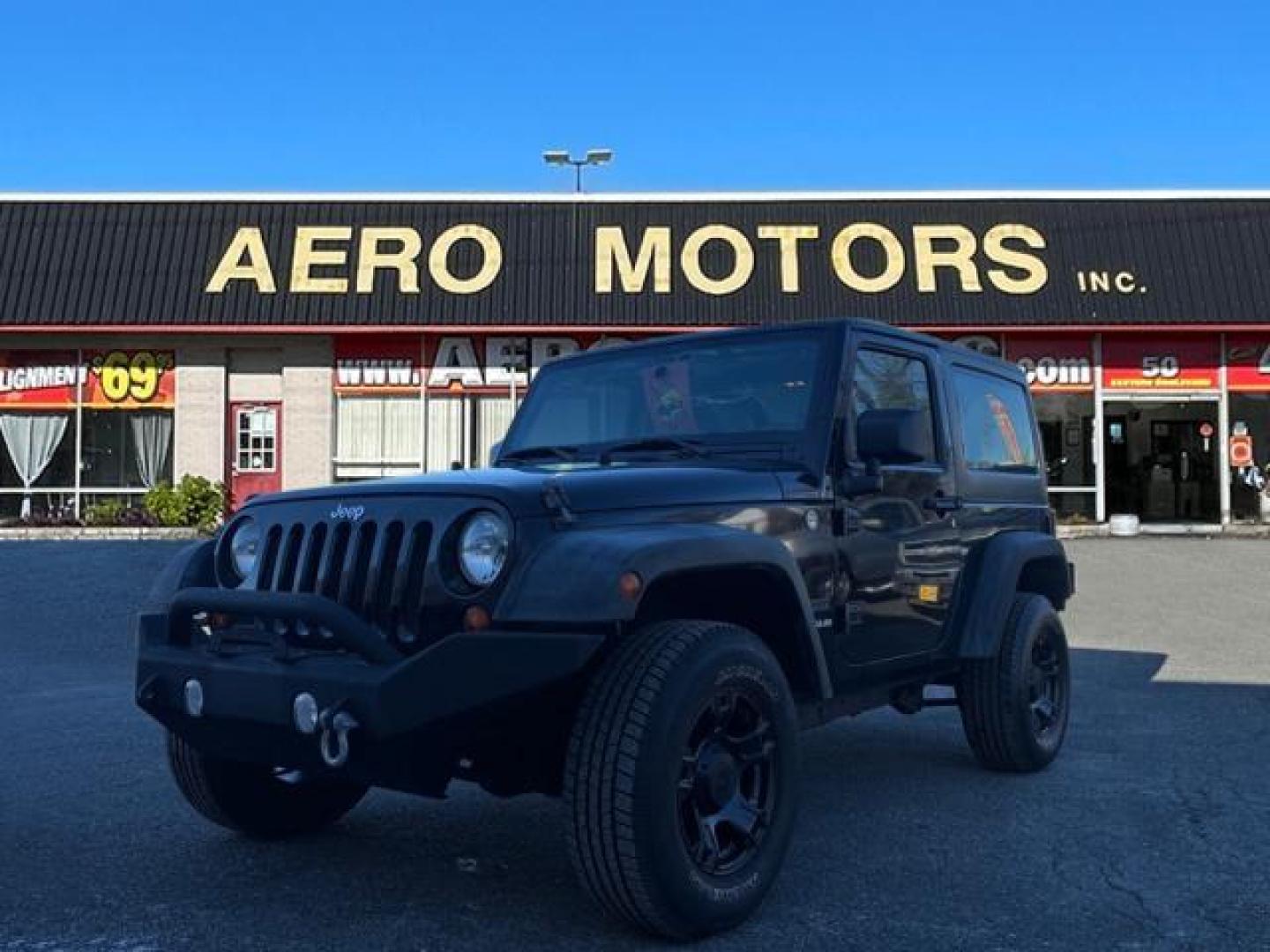 2011 Black Clear Coat Jeep Wrangler Sport (1J4AA2D15BL) with an 3.8L 3.8L V6 202hp 237ft. lbs. Sequential-Port F.I. engine, Automatic transmission, located at 50 Eastern Blvd., Essex, MD, 21221, (410) 686-3444, 39.304367, -76.484947 - Photo#0