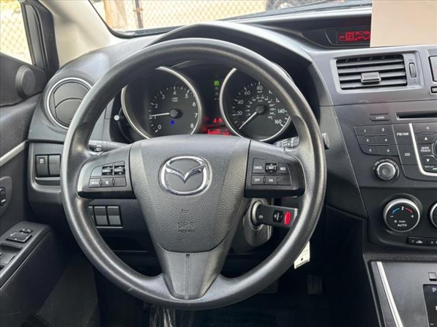 2013 Liquid Silver Metallic Mazda Mazda5 Sport (JM1CW2BL0D0) with an 2.5L 2.5L I4 157hp 163ft. lbs. Fuel Injected engine, 5-Speed Automatic with Sportshift Manual 5A transmission, located at 50 Eastern Blvd., Essex, MD, 21221, (410) 686-3444, 39.304367, -76.484947 - Photo#14