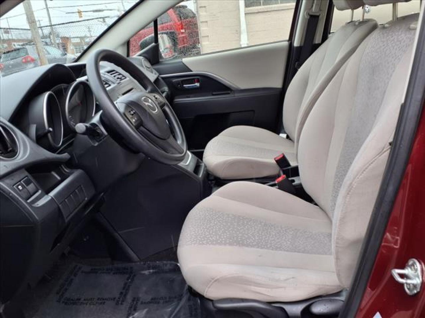 2012 Copper Red Mica Mazda Mazda5 Sport (JM1CW2BL0C0) with an 2.5L 2.5L I4 157hp 163ft. lbs. Fuel Injected engine, 5-Speed Automatic with Sportshift Manual 5A transmission, located at 50 Eastern Blvd., Essex, MD, 21221, (410) 686-3444, 39.304367, -76.484947 - Photo#12