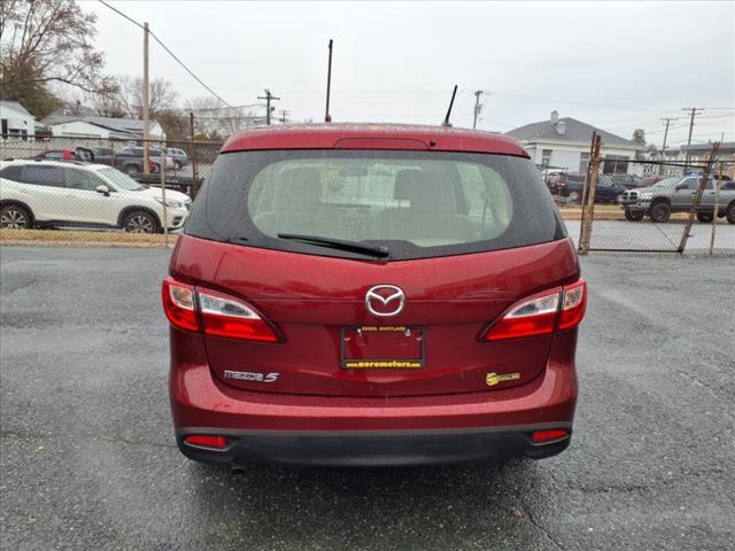 2012 Copper Red Mica Mazda Mazda5 Sport (JM1CW2BL0C0) with an 2.5L 2.5L I4 157hp 163ft. lbs. Fuel Injected engine, 5-Speed Automatic with Sportshift Manual 5A transmission, located at 50 Eastern Blvd., Essex, MD, 21221, (410) 686-3444, 39.304367, -76.484947 - Photo#3