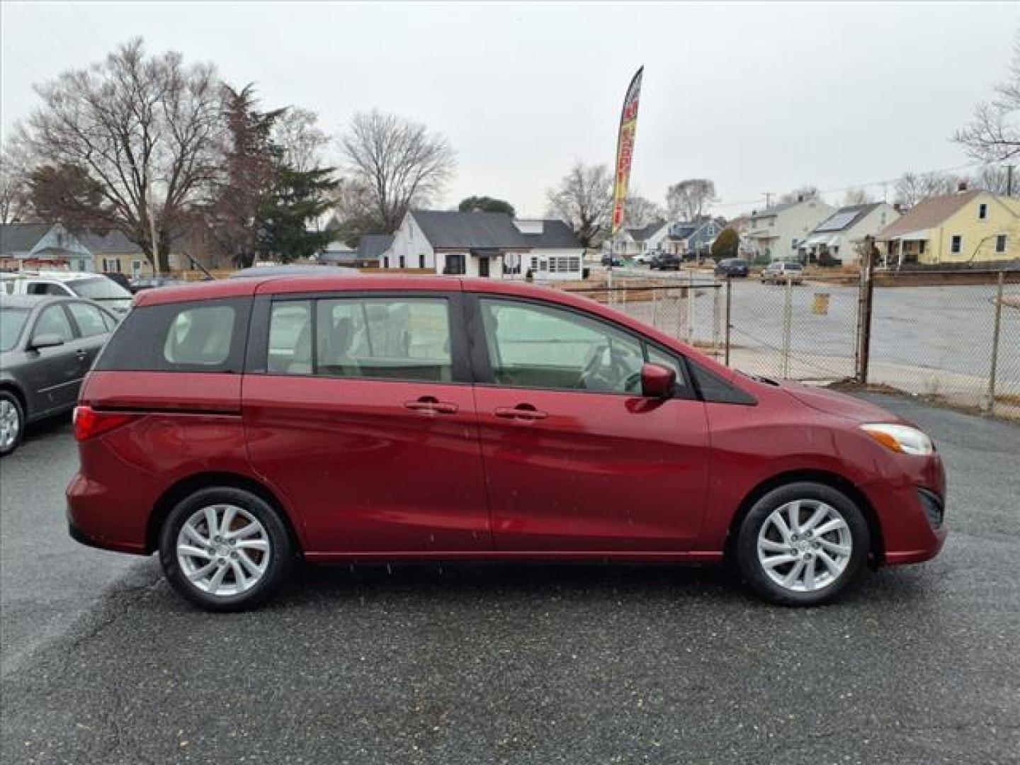 2012 Copper Red Mica Mazda Mazda5 Sport (JM1CW2BL0C0) with an 2.5L 2.5L I4 157hp 163ft. lbs. Fuel Injected engine, 5-Speed Automatic with Sportshift Manual 5A transmission, located at 50 Eastern Blvd., Essex, MD, 21221, (410) 686-3444, 39.304367, -76.484947 - Photo#6