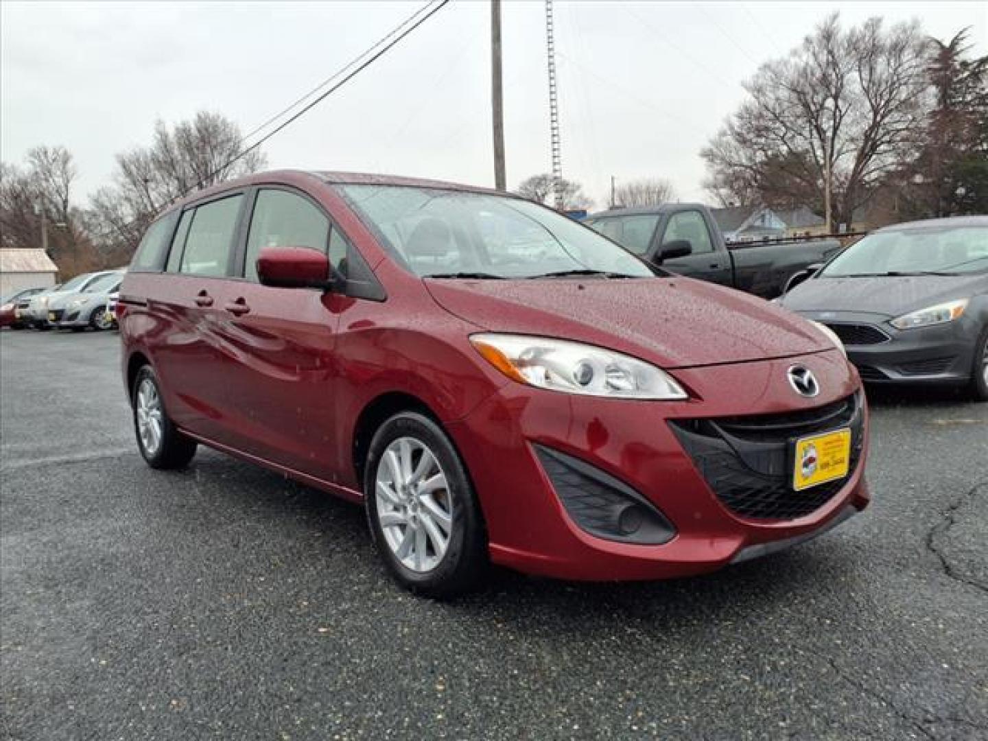 2012 Copper Red Mica Mazda Mazda5 Sport (JM1CW2BL0C0) with an 2.5L 2.5L I4 157hp 163ft. lbs. Fuel Injected engine, 5-Speed Automatic with Sportshift Manual 5A transmission, located at 50 Eastern Blvd., Essex, MD, 21221, (410) 686-3444, 39.304367, -76.484947 - Photo#7