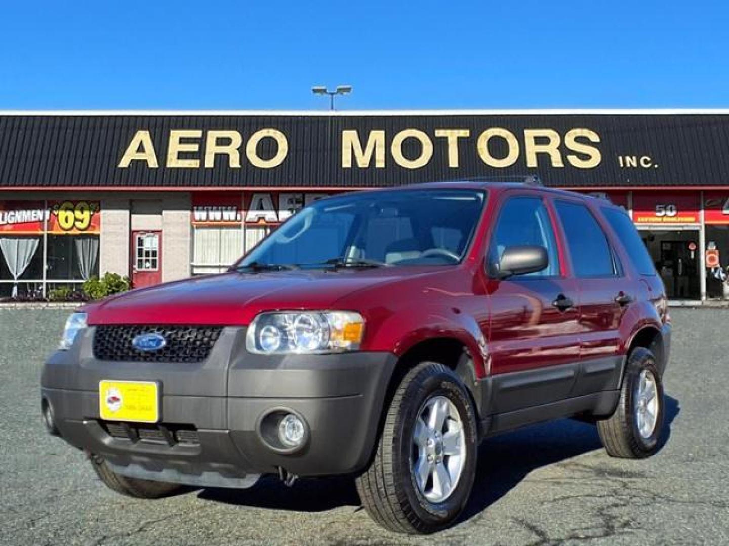 2006 Redfire Clearcoat Metallic Ford Escape XLT Sport (1FMYU03116K) with an 3.0L 3.0L NA V6 double overhead cam (DOHC) 24V Fuel Injected engine, 4-Speed Automatic transmission, located at 50 Eastern Blvd., Essex, MD, 21221, (410) 686-3444, 39.304367, -76.484947 - Photo#0