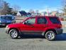 2006 Redfire Clearcoat Metallic Ford Escape XLT Sport (1FMYU03116K) with an 3.0L 3.0L NA V6 double overhead cam (DOHC) 24V Fuel Injected engine, 4-Speed Automatic transmission, located at 50 Eastern Blvd., Essex, MD, 21221, (410) 686-3444, 39.304367, -76.484947 - Photo#1