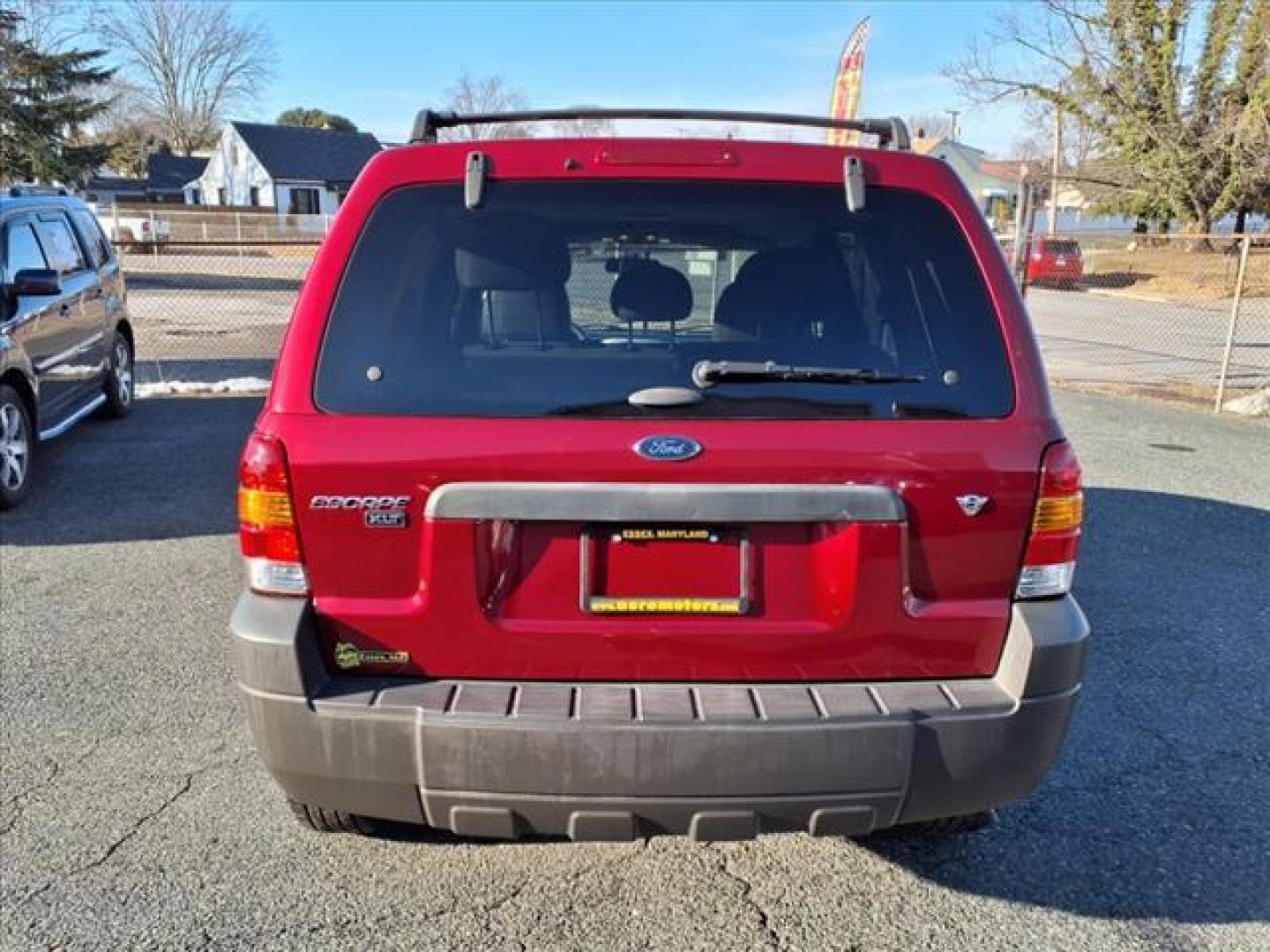 2006 Redfire Clearcoat Metallic Ford Escape XLT Sport (1FMYU03116K) with an 3.0L 3.0L NA V6 double overhead cam (DOHC) 24V Fuel Injected engine, 4-Speed Automatic transmission, located at 50 Eastern Blvd., Essex, MD, 21221, (410) 686-3444, 39.304367, -76.484947 - Photo#4