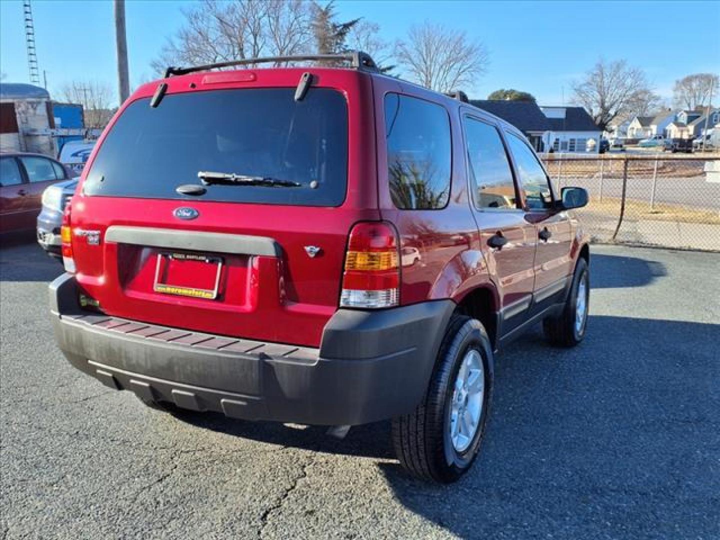 2006 Redfire Clearcoat Metallic Ford Escape XLT Sport (1FMYU03116K) with an 3.0L 3.0L NA V6 double overhead cam (DOHC) 24V Fuel Injected engine, 4-Speed Automatic transmission, located at 50 Eastern Blvd., Essex, MD, 21221, (410) 686-3444, 39.304367, -76.484947 - Photo#5