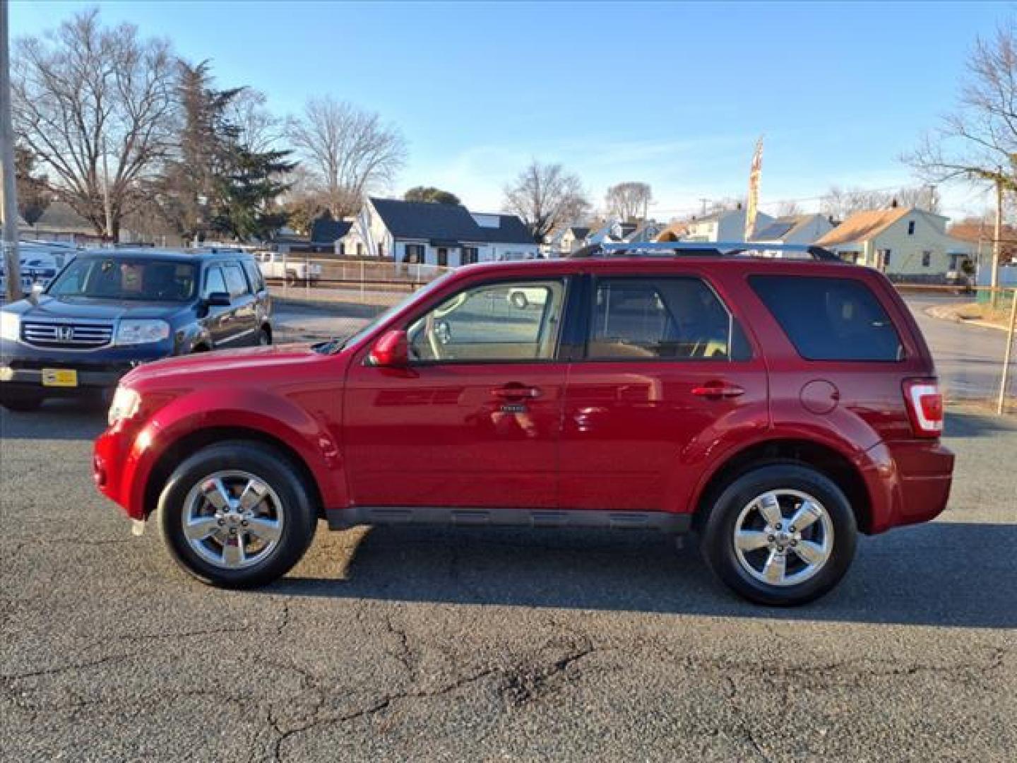 2011 Sangria Red Metallic Ford Escape Limited (1FMCU9EG5BK) with an 3.0L 6 Cylinder Sequential-Port F.I. engine, ATAWD transmission, located at 50 Eastern Blvd., Essex, MD, 21221, (410) 686-3444, 39.304367, -76.484947 - Photo#1