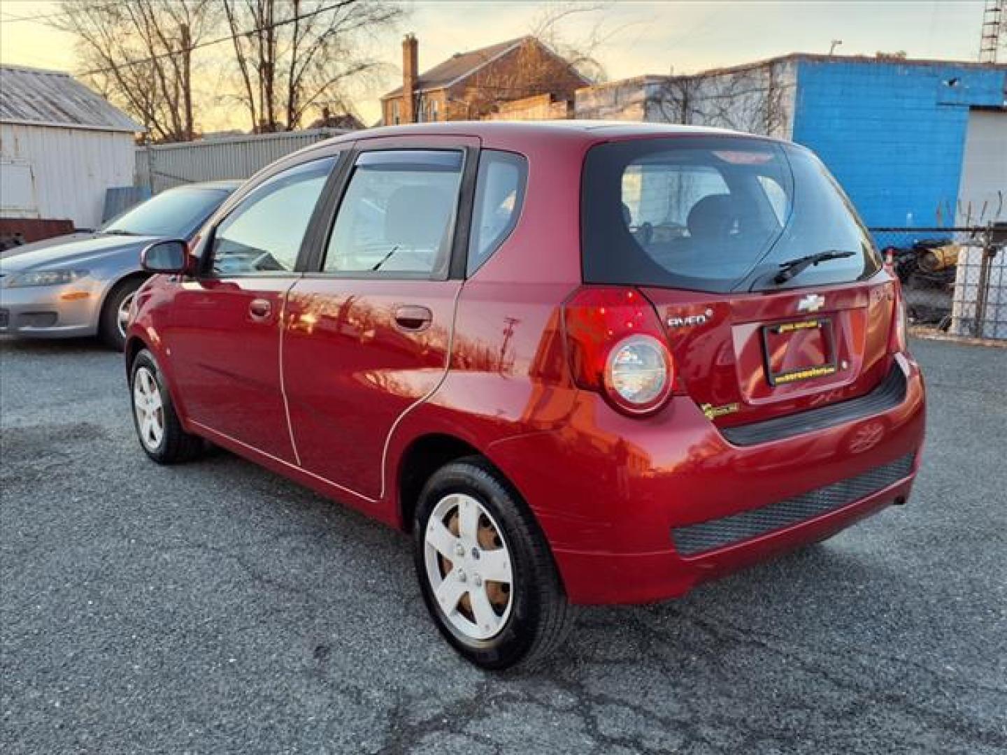 2009 Victory Red Chevrolet Aveo Aveo5 LS (KL1TD66E49B) with an 1.6L ECOTEC 1.6L I4 106hp 105ft. lbs. Sequential-Port F.I. engine, 5-Speed Manual transmission, located at 50 Eastern Blvd., Essex, MD, 21221, (410) 686-3444, 39.304367, -76.484947 - Photo#2