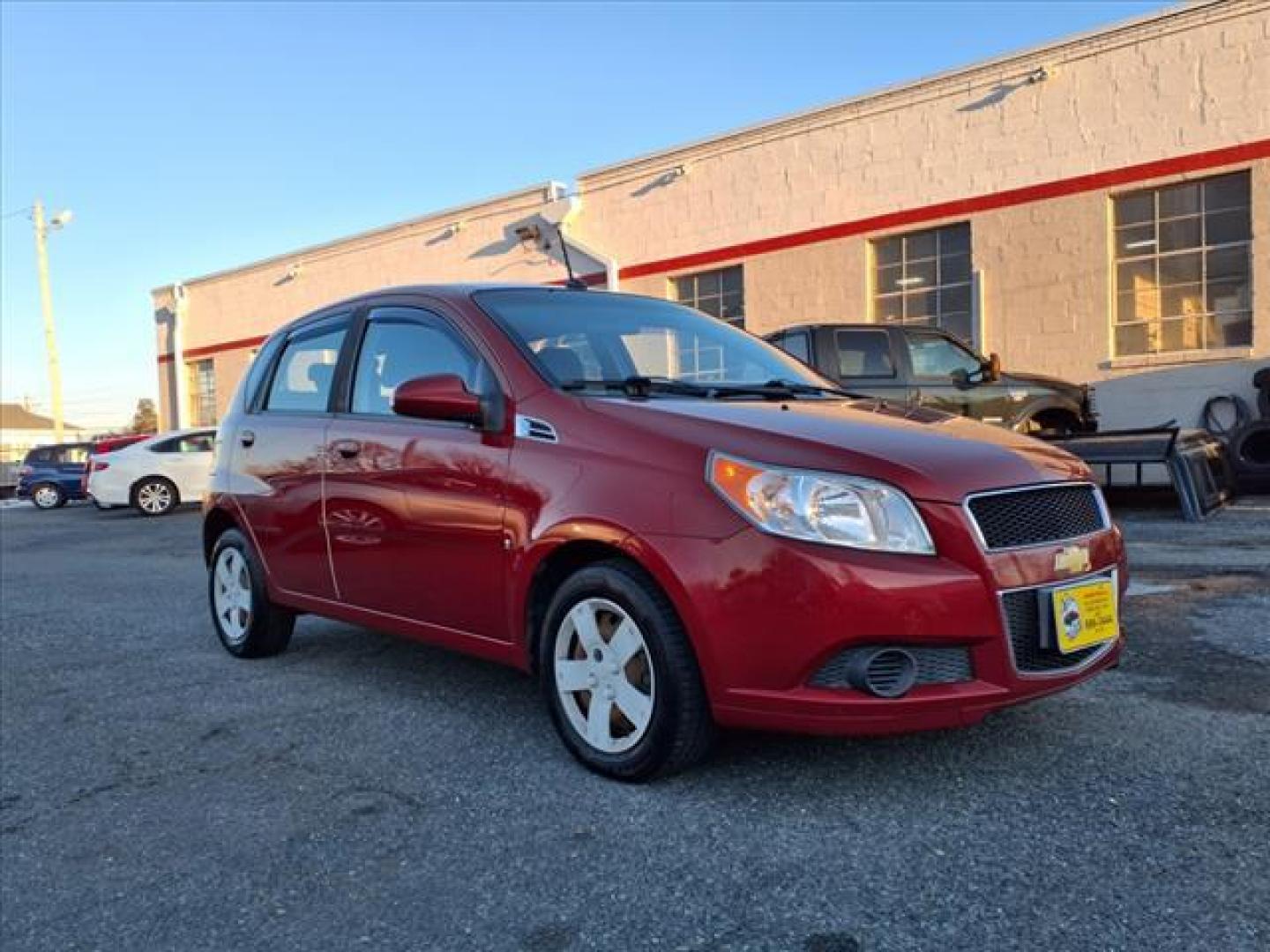 2009 Victory Red Chevrolet Aveo Aveo5 LS (KL1TD66E49B) with an 1.6L ECOTEC 1.6L I4 106hp 105ft. lbs. Sequential-Port F.I. engine, 5-Speed Manual transmission, located at 50 Eastern Blvd., Essex, MD, 21221, (410) 686-3444, 39.304367, -76.484947 - Photo#6