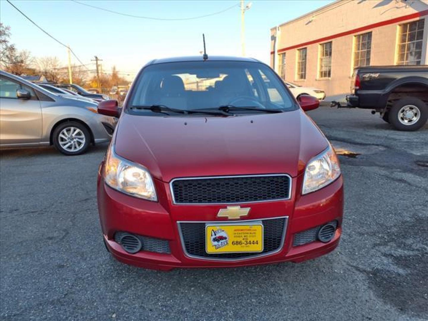 2009 Victory Red Chevrolet Aveo Aveo5 LS (KL1TD66E49B) with an 1.6L ECOTEC 1.6L I4 106hp 105ft. lbs. Sequential-Port F.I. engine, 5-Speed Manual transmission, located at 50 Eastern Blvd., Essex, MD, 21221, (410) 686-3444, 39.304367, -76.484947 - Photo#7