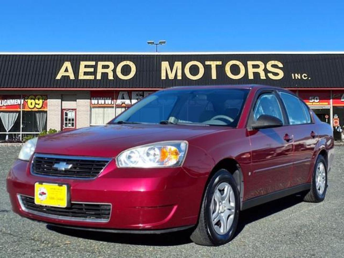 2006 Sport Red Metallic Chevrolet Malibu LS (1G1ZS51F36F) with an 2.2L 4 Cylinder Fuel Injected engine, Automatic transmission, located at 50 Eastern Blvd., Essex, MD, 21221, (410) 686-3444, 39.304367, -76.484947 - Photo#0