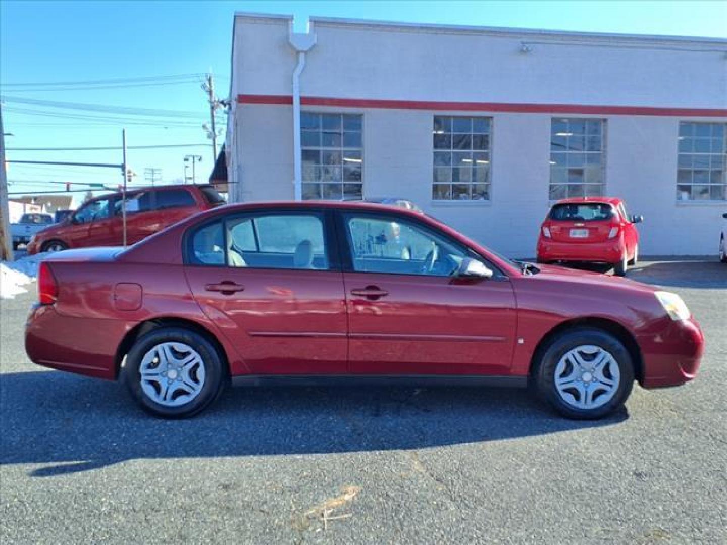 2006 Sport Red Metallic Chevrolet Malibu LS (1G1ZS51F36F) with an 2.2L 4 Cylinder Fuel Injected engine, Automatic transmission, located at 50 Eastern Blvd., Essex, MD, 21221, (410) 686-3444, 39.304367, -76.484947 - Photo#4