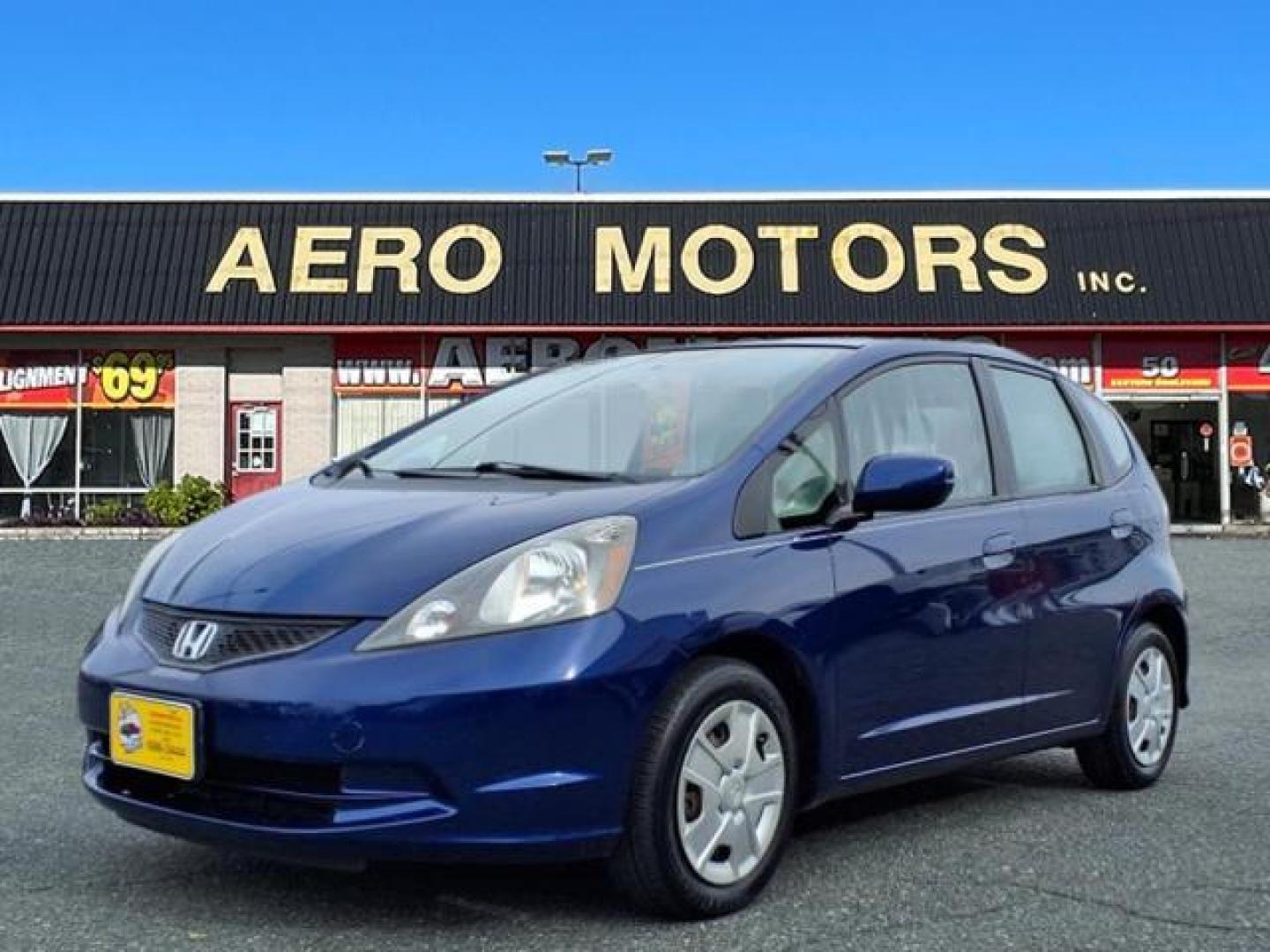 2013 Blue Raspberry Metallic Honda Fit Base (JHMGE8G36DC) with an 1.5L 4 Cylinder Sequential-Port F.I. engine, 5SP transmission, located at 50 Eastern Blvd., Essex, MD, 21221, (410) 686-3444, 39.304367, -76.484947 - Photo#0