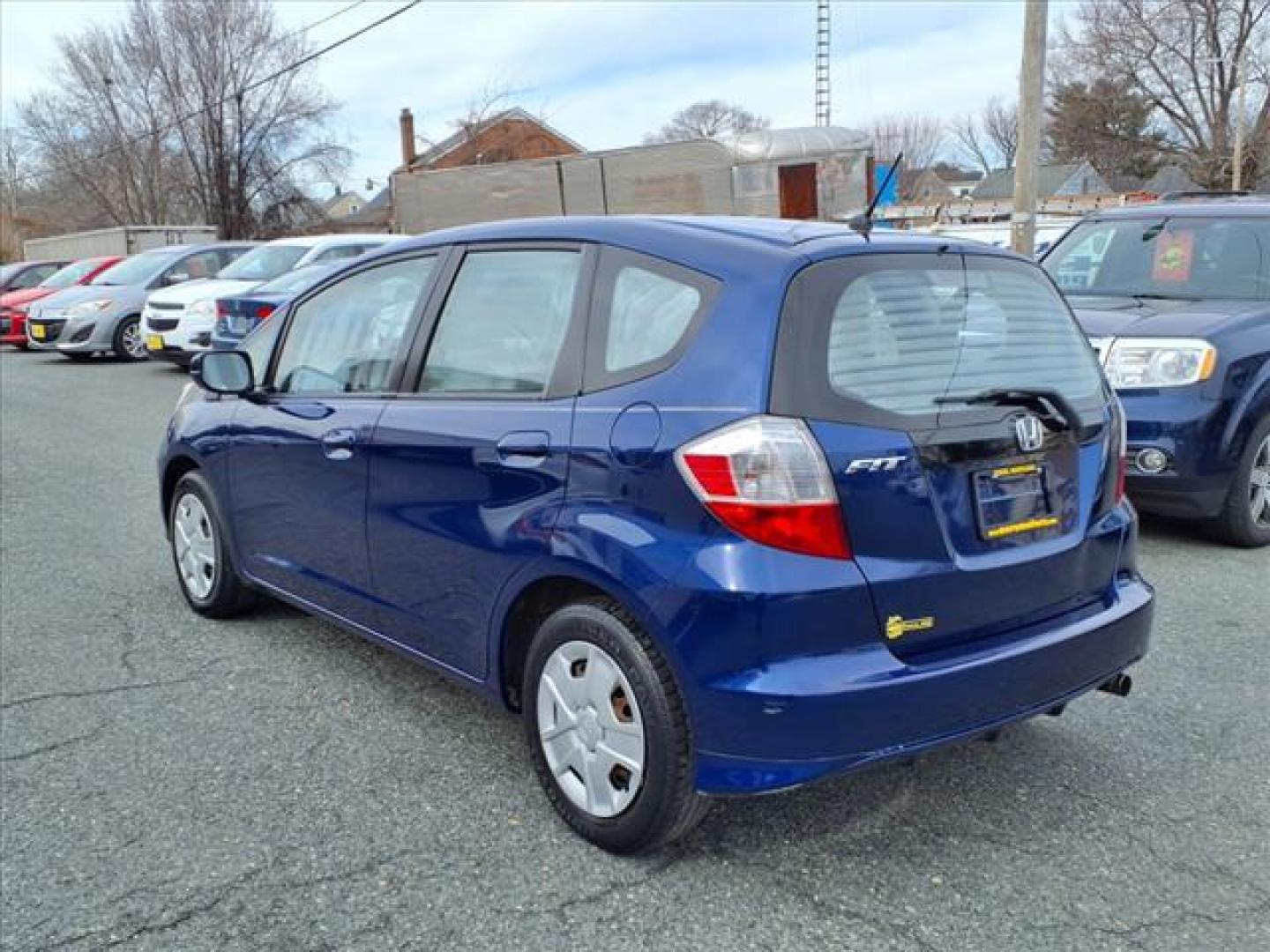 2013 Blue Raspberry Metallic Honda Fit Base (JHMGE8G36DC) with an 1.5L 4 Cylinder Sequential-Port F.I. engine, 5SP transmission, located at 50 Eastern Blvd., Essex, MD, 21221, (410) 686-3444, 39.304367, -76.484947 - Photo#2