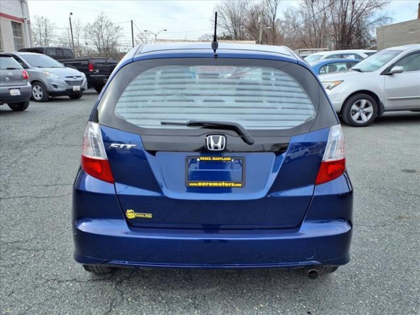 2013 Blue Raspberry Metallic Honda Fit Base (JHMGE8G36DC) with an 1.5L 4 Cylinder Sequential-Port F.I. engine, 5SP transmission, located at 50 Eastern Blvd., Essex, MD, 21221, (410) 686-3444, 39.304367, -76.484947 - Photo#3