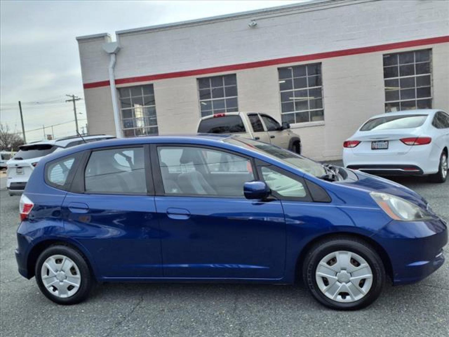 2013 Blue Raspberry Metallic Honda Fit Base (JHMGE8G36DC) with an 1.5L 4 Cylinder Sequential-Port F.I. engine, 5SP transmission, located at 50 Eastern Blvd., Essex, MD, 21221, (410) 686-3444, 39.304367, -76.484947 - Photo#6