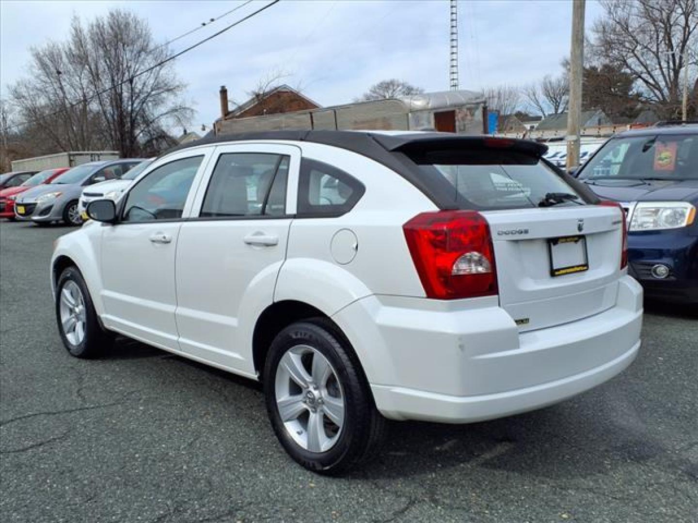 2012 Bright White Clear Coat Dodge Caliber SXT (1C3CDWDAXCD) with an 2.0L 4 Cylinder Sequential-Port F.I. engine, Automatic transmission, located at 50 Eastern Blvd., Essex, MD, 21221, (410) 686-3444, 39.304367, -76.484947 - Photo#2